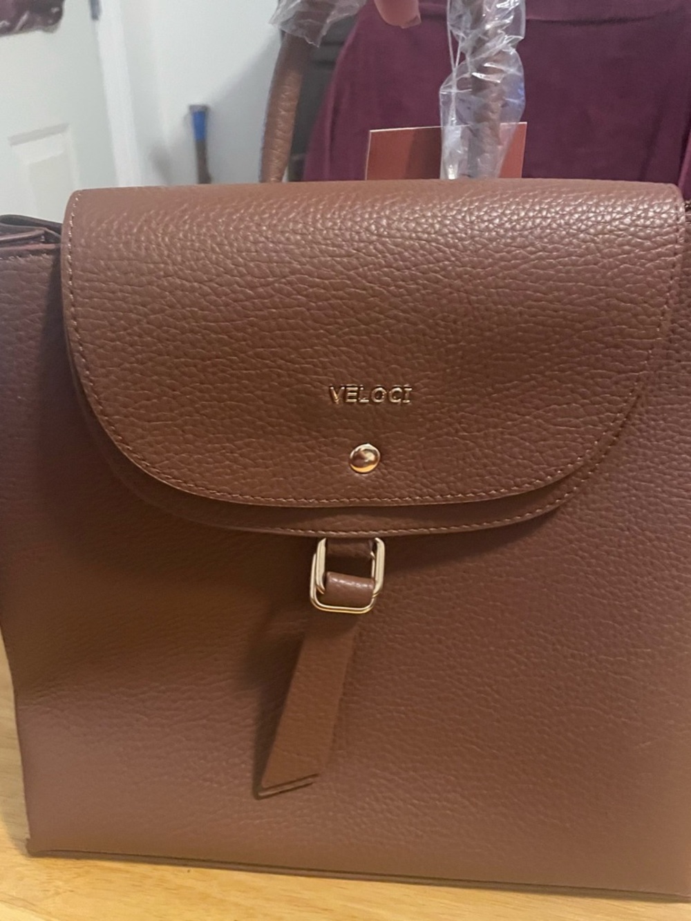 Brown Pebbled Backpack with Gold Accent